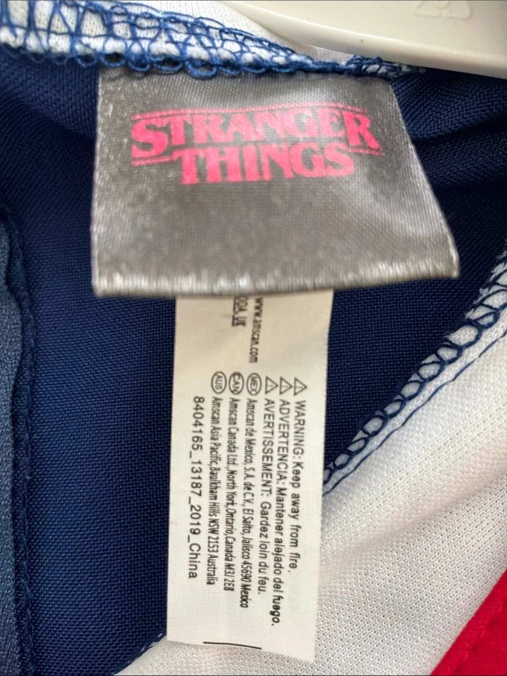 Amscan Stranger Things Navy and Pink Costume Tag Ronin Scoops Ahoy tween costume